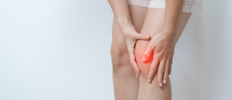 woman having knee ache and muscle pain due to Runners Knee or Patellofemoral Pain Syndrome, osteoarthritis, arthritis, rheumatism and Patellar Tendinitis. medical concept