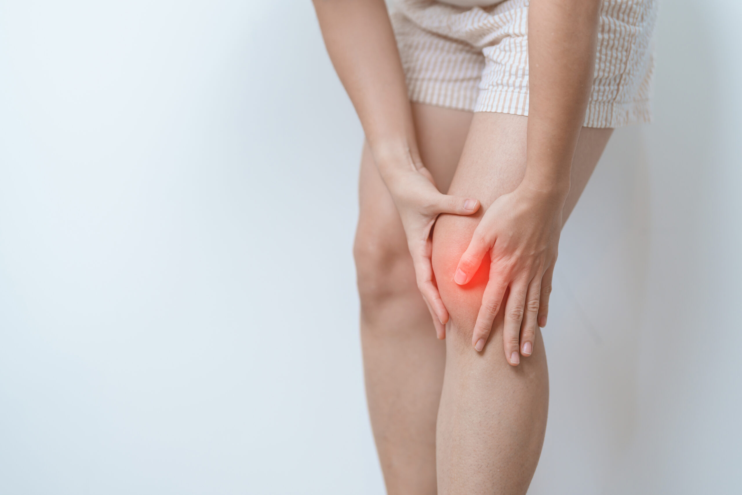 woman having knee ache and muscle pain due to Runners Knee or Patellofemoral Pain Syndrome, osteoarthritis, arthritis, rheumatism and Patellar Tendinitis. medical concept